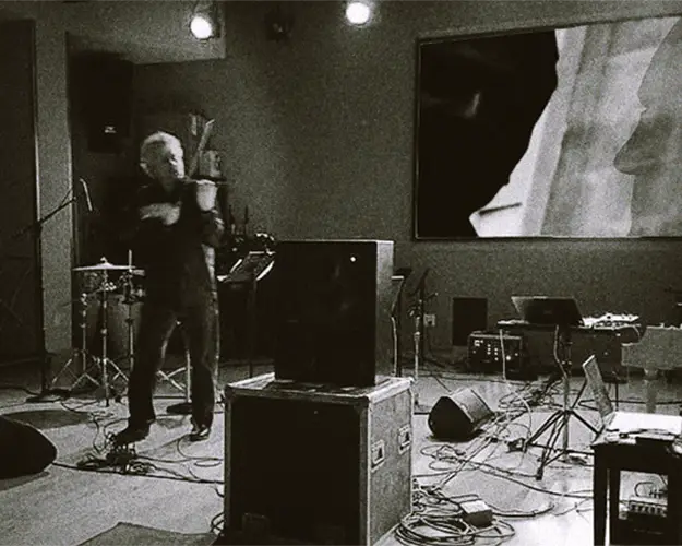 Intermedia performance space with violin, electronics, and projected imagery